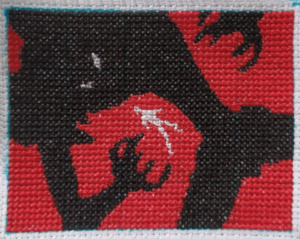 Complete A little man manipulated by a black shadow cross-stitching design