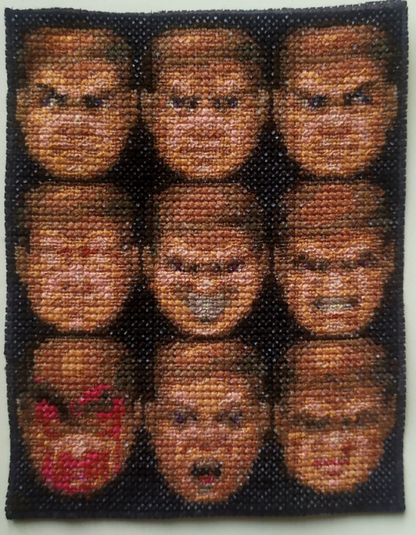 完成 Doom 電腦遊戲主角的笑臉 十字縫設計