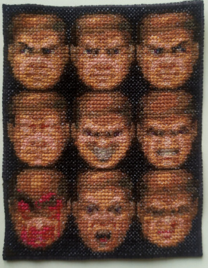 完成 Doom 電腦遊戲主角的笑臉 十字縫設計